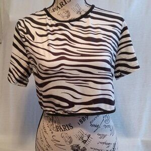 Women's cropped top with a zebra print, short sleeves, and ties at the back